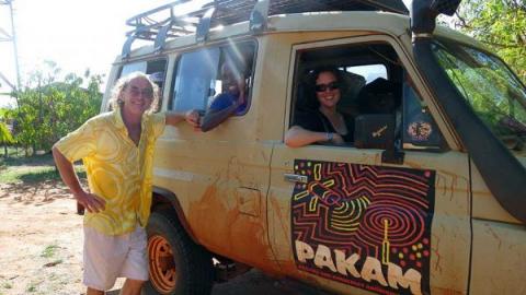 Neil Turner standing next to PAKAM work vehicle